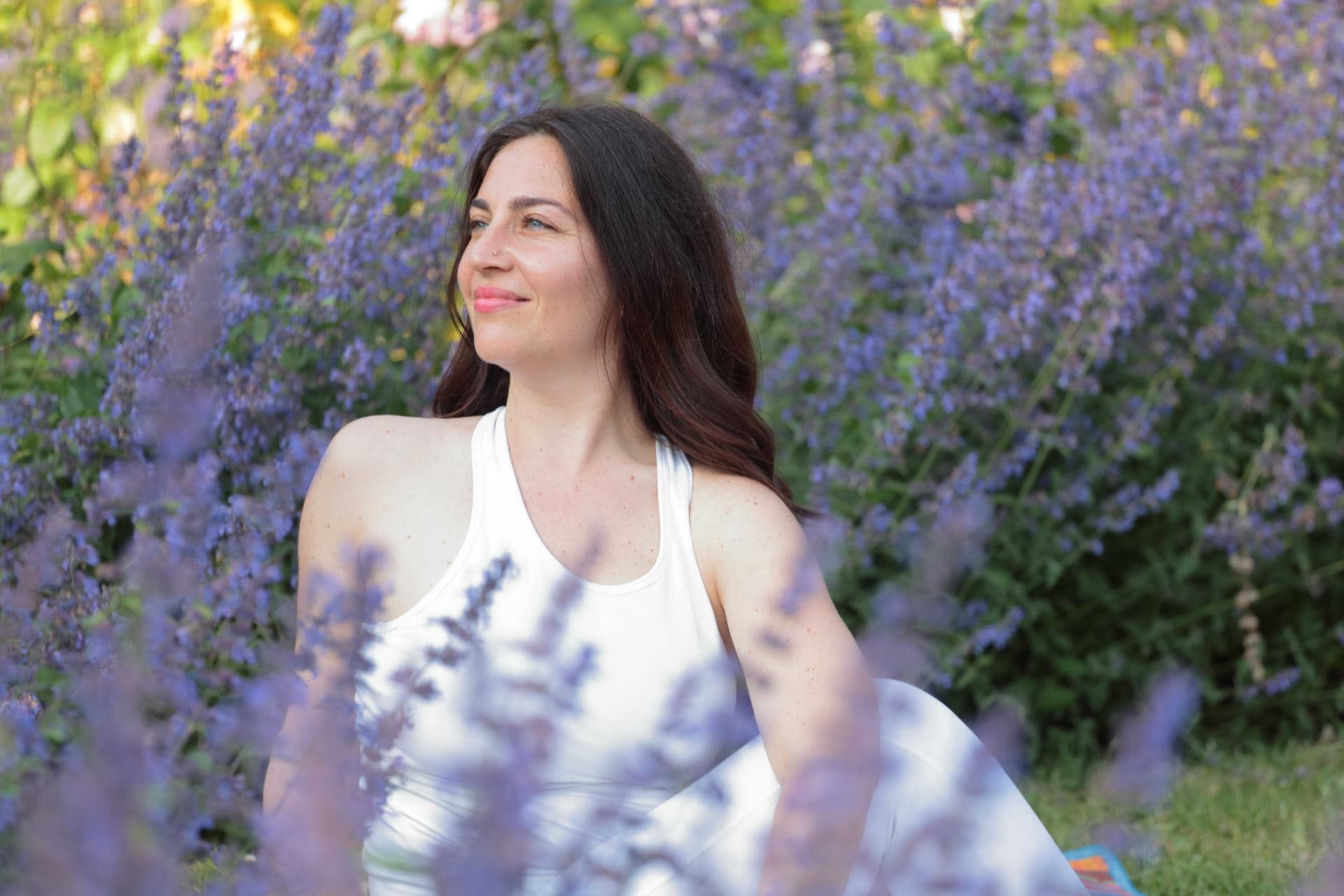 Alyona, founder of Awaken The Light Within, guiding a calm, grounded practice.